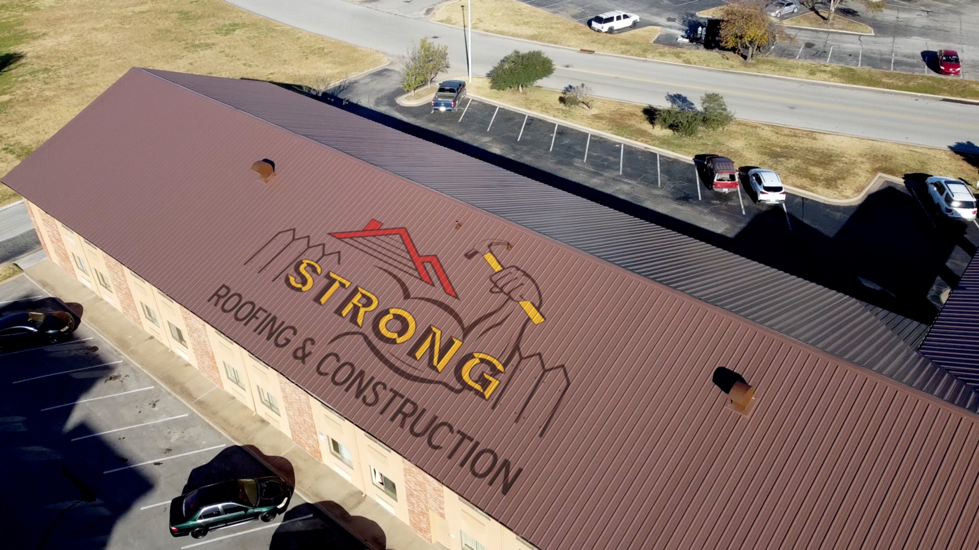 Aerial drone photo of Strong Roofing metal roof installation