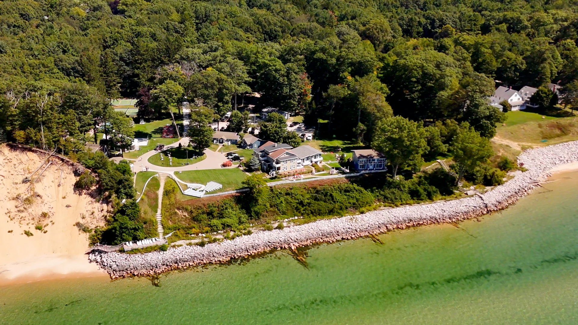 Aerial drone view of Michillinda Lodge next to White Lake in Michigan